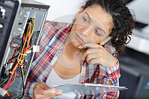 woman holds measures pc cables