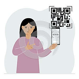 A woman holds a mobile phone in his hand with the text scan me and scans the qr code, which is located nearby.