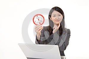 Woman holds non smoking sign