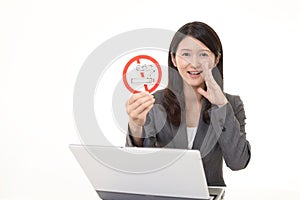 Woman holds non smoking sign