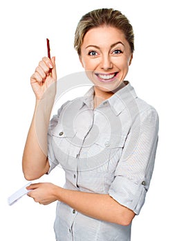 Woman holds pen and notebook