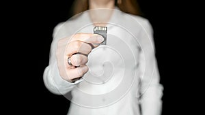 Woman Holds SD Memory Card