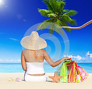 Woman on Holiday by the Beach with Shopping Bags