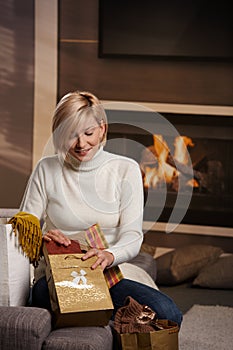 Woman at home with shopping bags