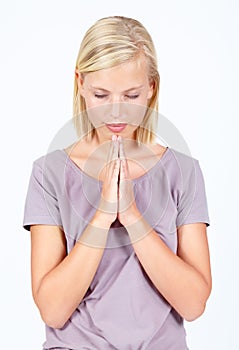 Woman, hope and praying hands in god worship, mental health help or faith routine on white studio background. Nervous
