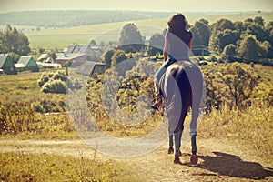 Woman during horseback riding.