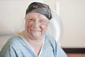 Woman in hospital bed suffering from cancer