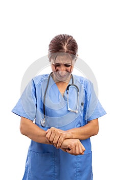 Woman hospital nurse or doctor in scrubs holding painful wrist