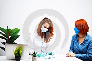 Woman at the hospital submits a blood test for a.