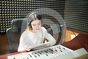 Woman hosting live show on radio