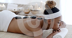 Woman With Hot Stones Massage