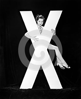 Woman with huge letter X