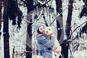 Woman hugging a dog