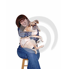 Woman hugging her dog.