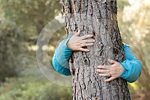 woman hugging a tree