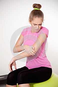 Woman with hurting arm