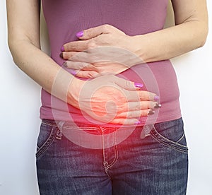 Woman hurts her intestine, syndrome, abdominal digestion stomach