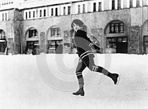 Woman ice skating outside