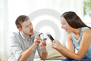 Woman ignoring a marriage proposal photo