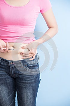 Woman inject to belly