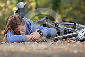 Woman with injured wrist after bicycle accident