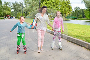 A woman instills in her children a love of sports-roller skating