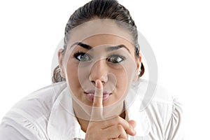 Woman instructing to be silent