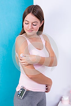 Woman with insulin patch