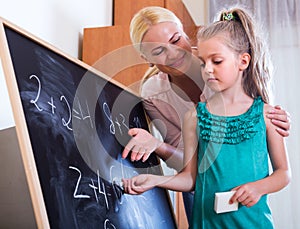 Woman introducing numbers to girl