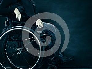 Woman invalid girl sitting on wheelchair