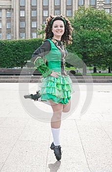 Woman in irish dance dress dancing
