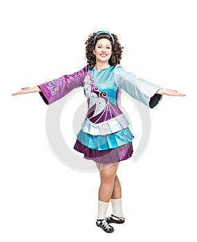 Woman in irish dance dress welcoming isolated