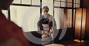 Woman, Japanese and tea ceremony for healing practice or respect for ritual, wellness or tatami room. Female person
