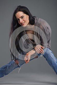 Woman in jeans with holes