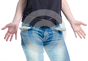 Woman in jeans showing empty pockets no money