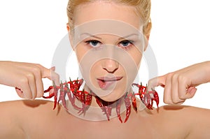 woman with jewelry of hot pepper