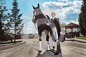 Woman jockey with his horse