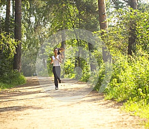 Woman jogger in countryside