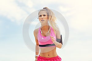 Woman jogging on the beach