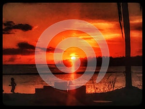 Woman jogging in beach during Florida Keys sunset