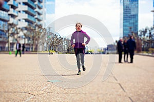 Woman Jogging In La Defense, Paris