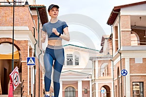 Woman is jogging, running. Motivation heatlhy fit living. Healthy pretty female run.