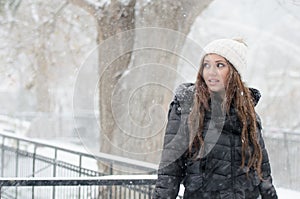 Woman joying the snow day