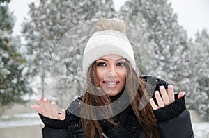 Woman joying the snow day