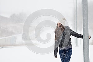 Woman joying the snow day