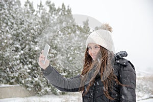 Woman joying the snow day