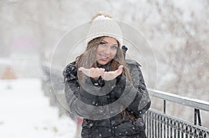 Woman joying the snow day
