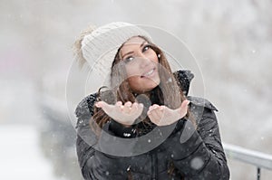 Woman joying the snow day