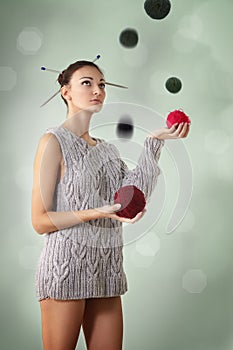 Woman juggle clew