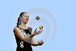 Woman Juggling Balls